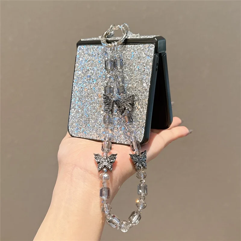 For Samsung Galaxy Z Flip7 5G Case Glitter Rhinestone TPU PC Phone Cover with Butterfly Wrist Strap - Silver