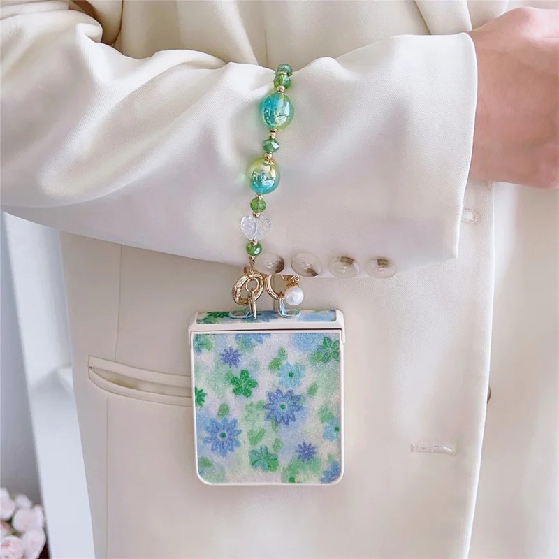 For Samsung Galaxy Z Flip7 5G Case Glitter Flower TPU + PC Phone Cover with Beaded Wrist Strap - Green