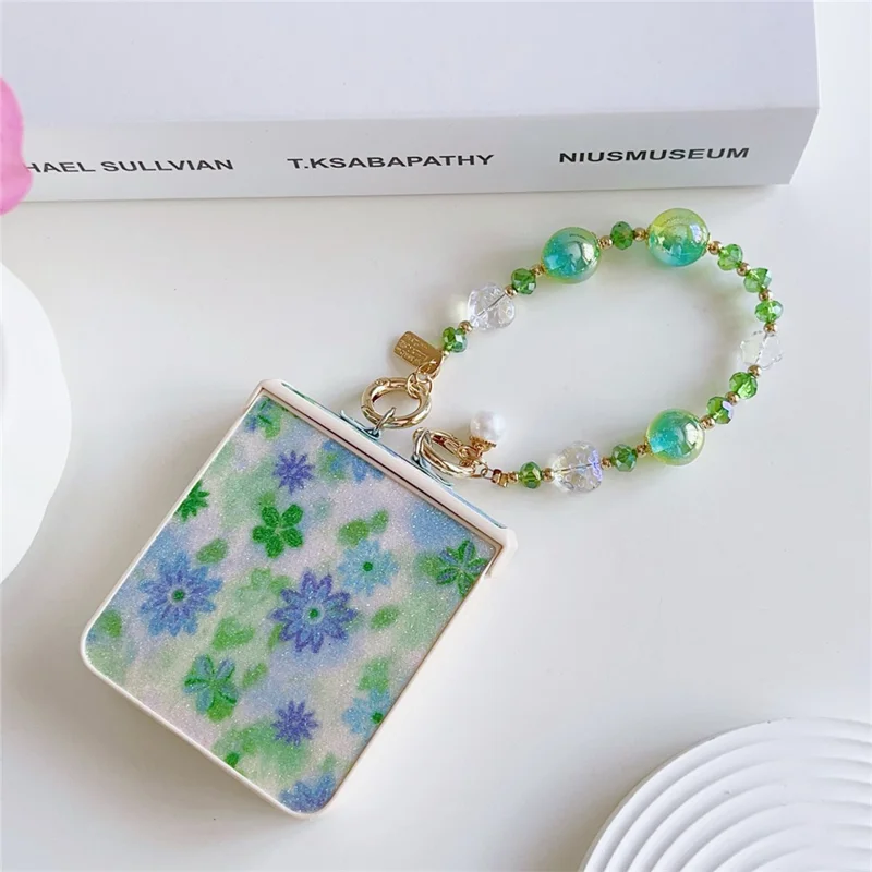 For Samsung Galaxy Z Flip7 5G Case Glitter Flower TPU + PC Phone Cover with Beaded Wrist Strap - Green