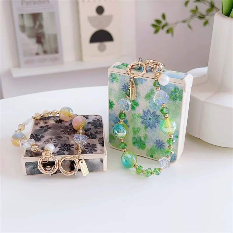 For Samsung Galaxy Z Flip7 5G Case Glitter Flower TPU + PC Phone Cover with Beaded Wrist Strap - Green
