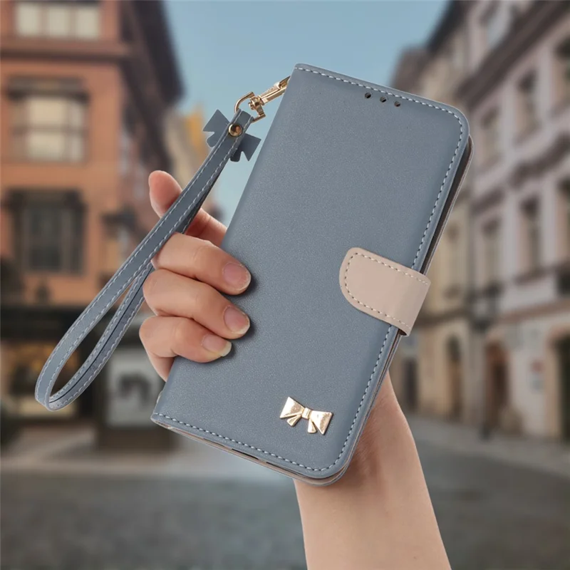 Xiaomi Redmi Note 15 Pro 5G hoesje met strikdecor, portemonnee van lederen telefoonhoes met polsbandje - Babyblauw