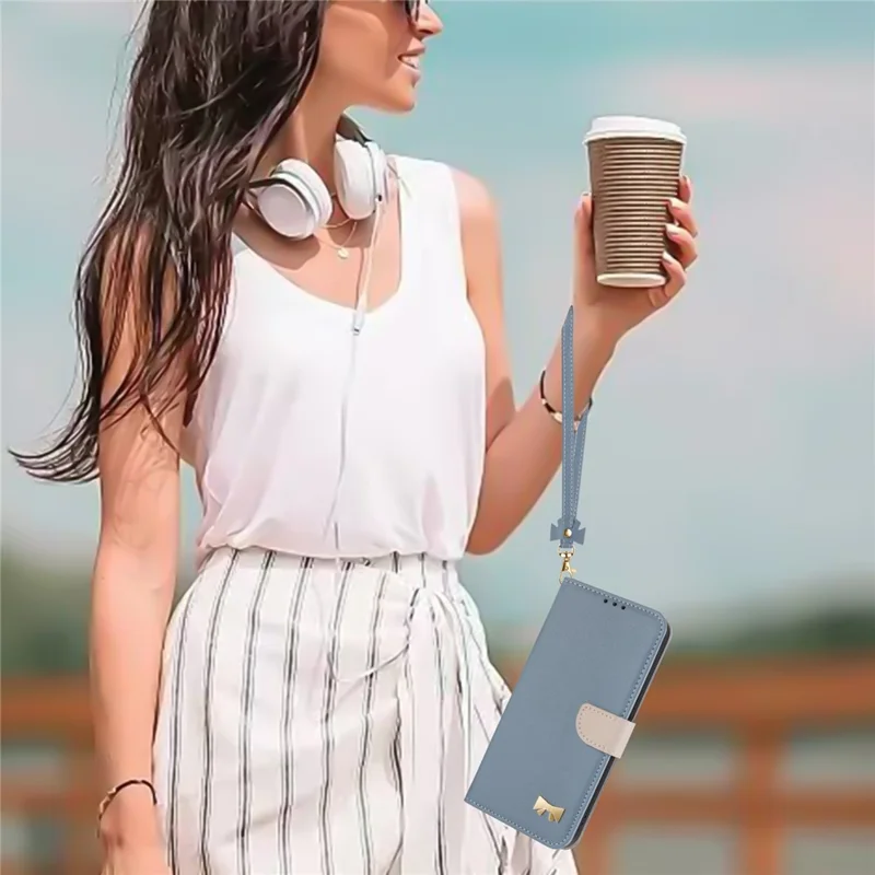 Xiaomi Redmi Note 15 Pro 5G hoesje met strikdecor, portemonnee van lederen telefoonhoes met polsbandje - Babyblauw