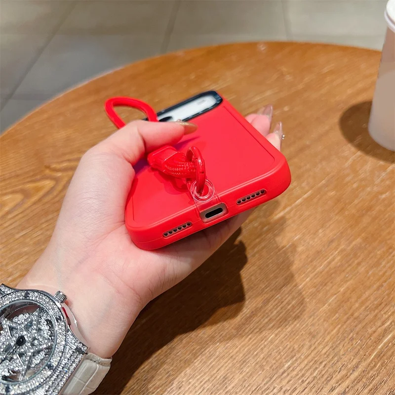 For iPhone 17 Pro Case Black Lens Frame Shockproof TPU PC Phone Back Cover with Wrist Strap - Red