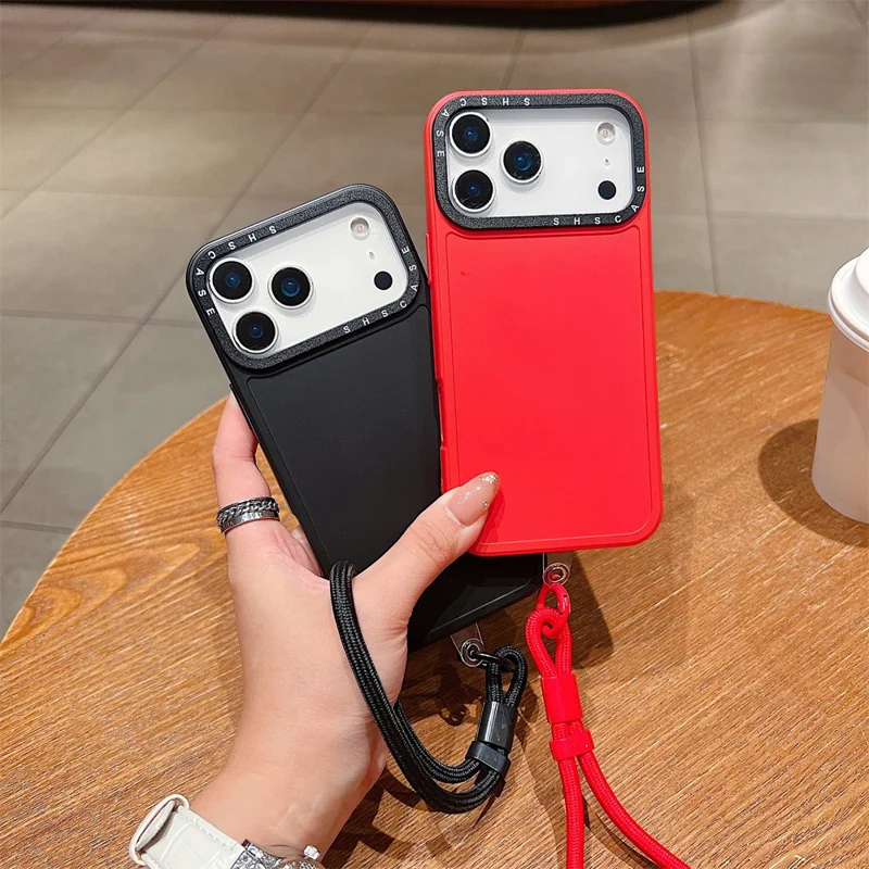 For iPhone 18 Pro Max / 17 Pro Max Case Black Lens Frame Shockproof TPU PC Phone Back Cover with Wrist Strap - Red