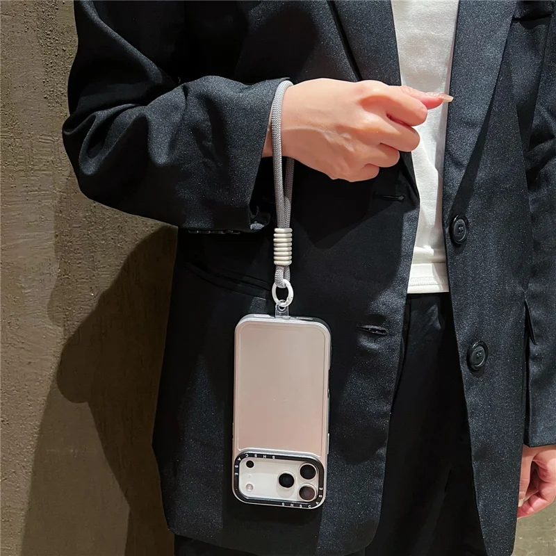 For iPhone 17 Pro Case Black Lens Frame Metal Paint Finish PC + TPU Phone Back Cover with Wrist Strap - Silver