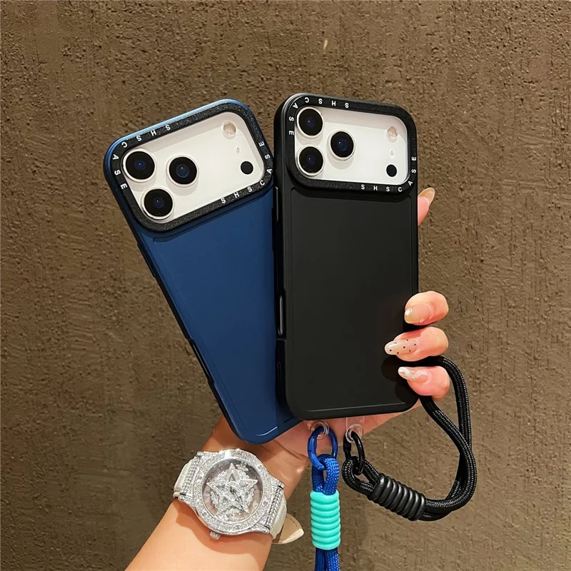 For iPhone 17 Pro Case Black Lens Frame Metal Paint Finish PC + TPU Phone Back Cover with Wrist Strap - Silver