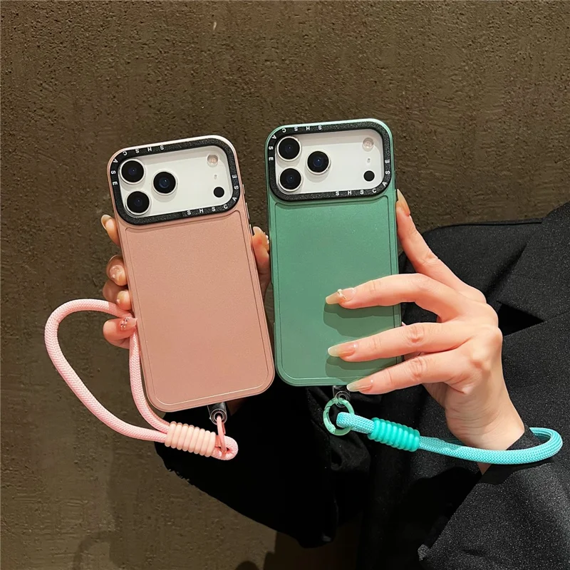 For iPhone 17 Pro Case Black Lens Frame Metal Paint Finish PC + TPU Phone Back Cover with Wrist Strap - Silver