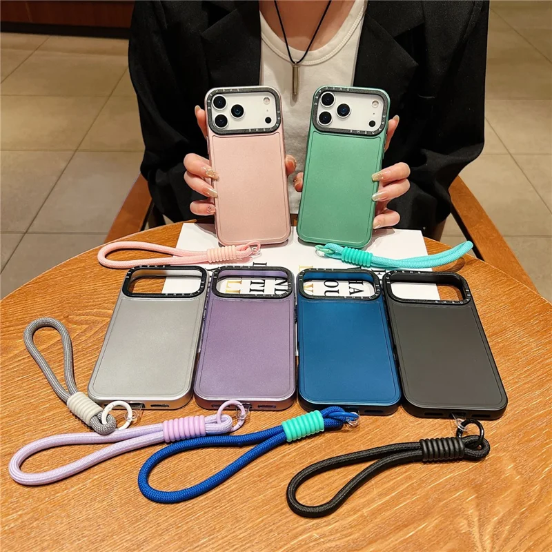 For iPhone 17 Pro Case Black Lens Frame Metal Paint Finish PC + TPU Phone Back Cover with Wrist Strap - Silver