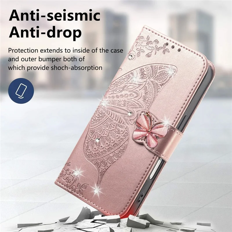 For iPhone 17 Case 3D Rhinestone Decor Butterfly Flower Leather Phone Cover with Wrist Strap - Rose Gold