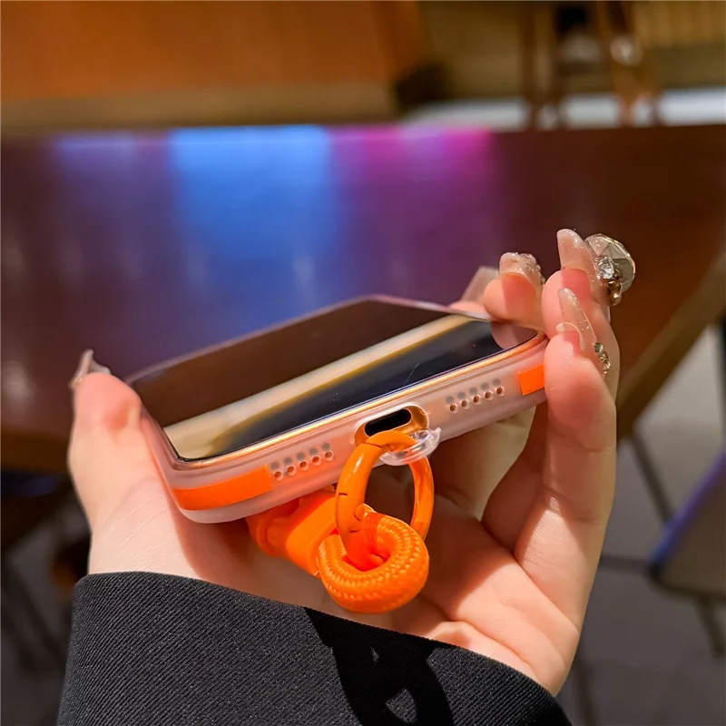 For iPhone 17 Pro Case Compatible with MagSafe Corrugated Texture TPU PC Phone Cover with Adjustable Wrist Strap - Orange