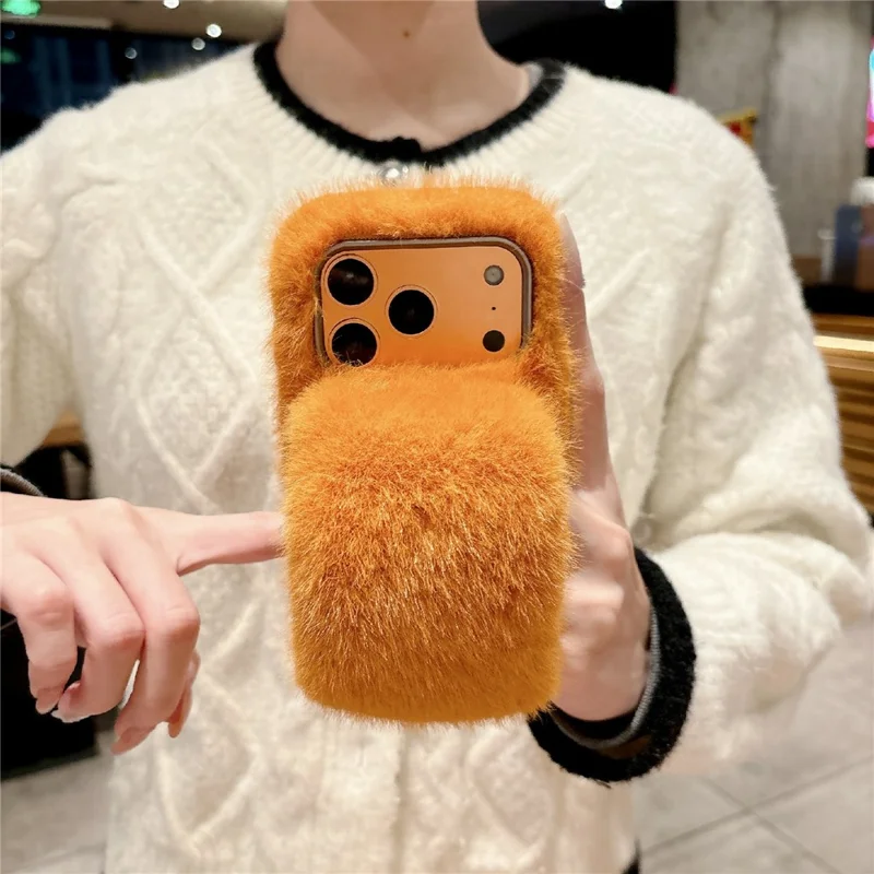 For iPhone 17 Pro Max Solid Color Fluffy Phone Case Winter Warm Hand Strap TPU Cover - Orange