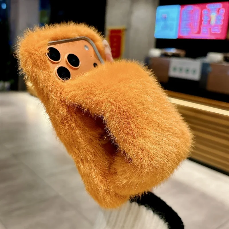 For iPhone 17 Pro Solid Color Fluffy Phone Case Winter Warm Hand Strap TPU Cover - Orange