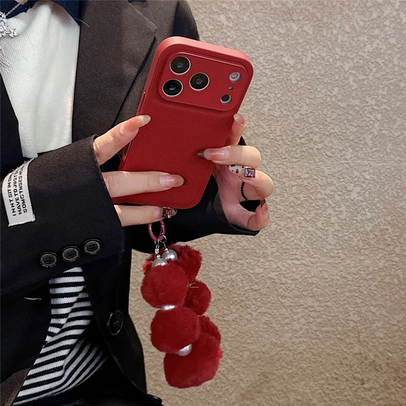 For iPhone 17 Pro Max Case TPU PU Leather PC Anti-drop Phone Back Cover with Wrist Strap - Red Plush Circle