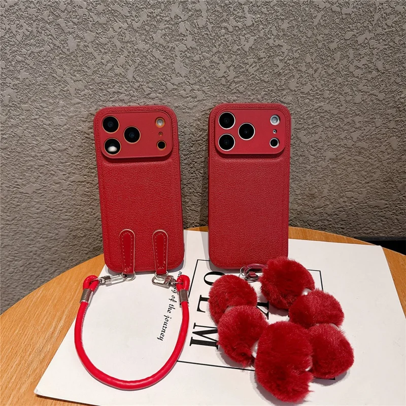 For iPhone 17 Pro Case TPU PU Leather PC Anti-drop Phone Back Cover with Wrist Strap - Red Leather Strip