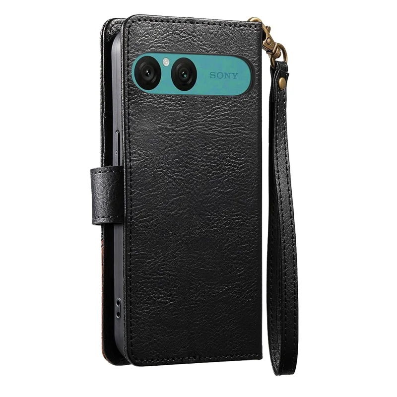 For Sony Xperia 10 VII Case Color Splicing TPU PU Leather Flip Shockproof Phone Cover with Wrist Strap - Black