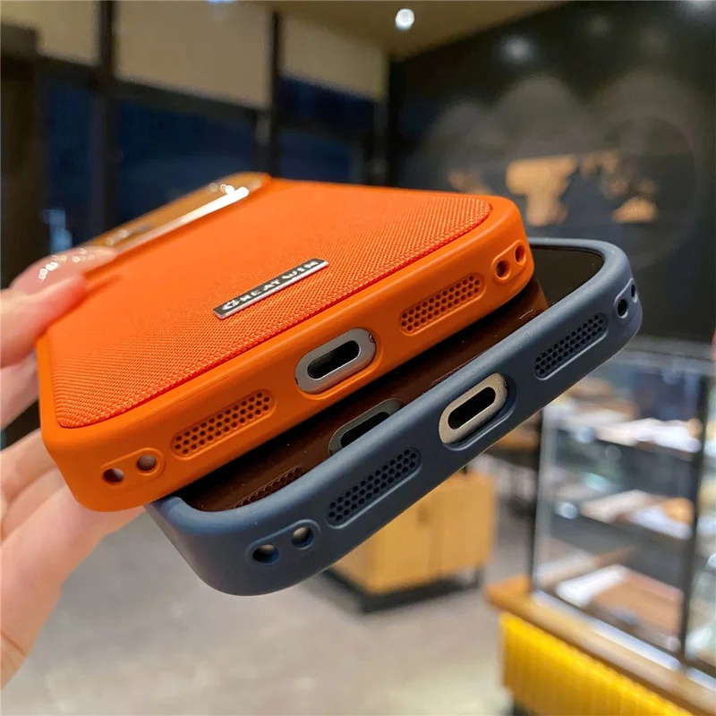 For iPhone 17 Pro Magnetic Case TPU + PU Leather Anti-Drop Phone Cover Compatible with MagSafe - Orange