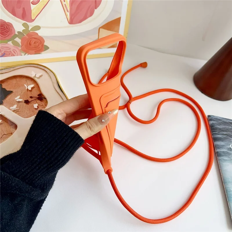 For iPhone 17 Pro Liquid Silicone Card Slot Cover Anti Scratch Protection Phone Case with Strap - Orange