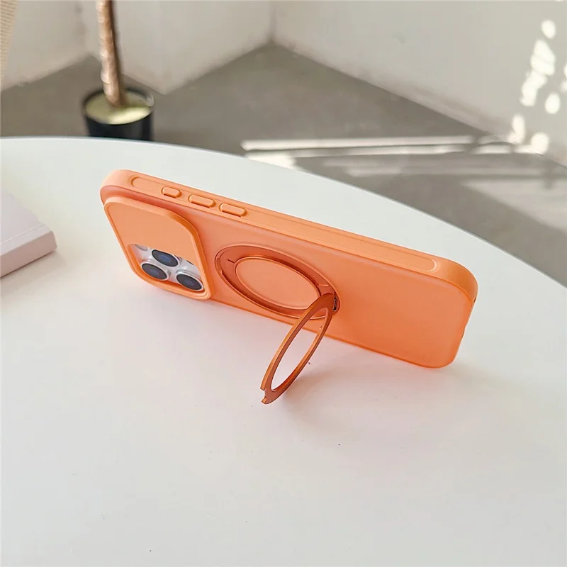 For iPhone 16 Pro Magnetic Case Rotating Ring Kickstand PC + TPU Skin-touch Phone Cover - Transparent Orange