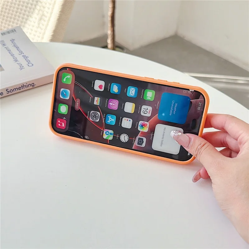 For iPhone 16 Pro Magnetic Case Rotating Ring Kickstand PC + TPU Skin-touch Phone Cover - Transparent Orange