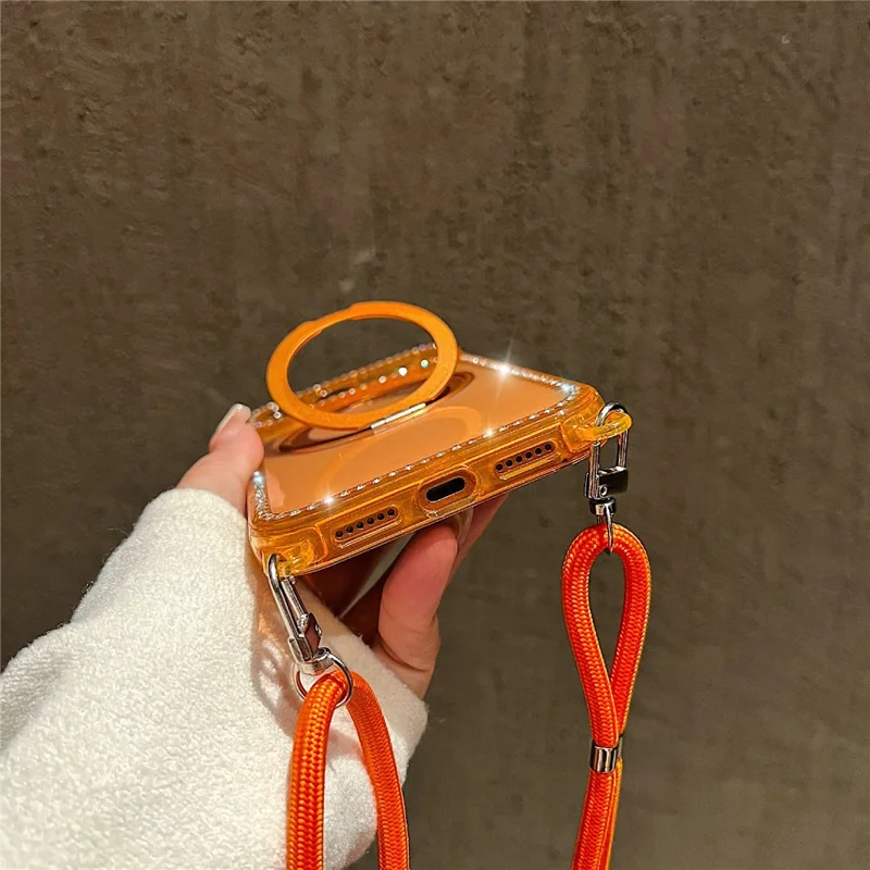 For iPhone 17 Pro Max Magnetic Case Ring Kickstand PC + TPU Rhinestones Decor Phone Cover with Shoulder Strap - Orange
