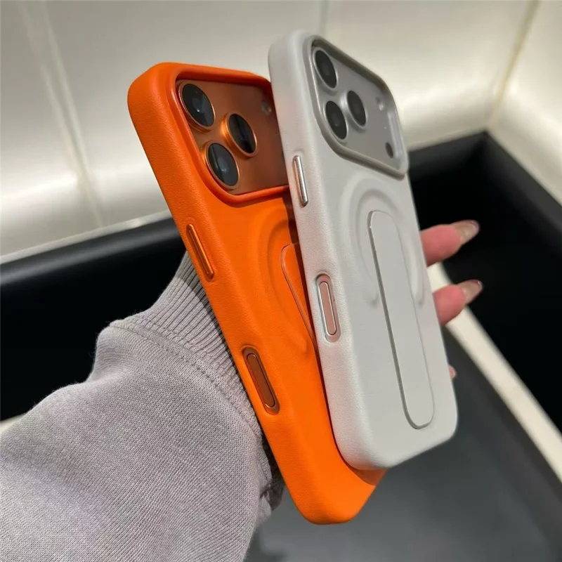 For iPhone 17 Pro Magnetic Case Finger Holder Kickstand PU Leather + PC Phone Cover - Orange