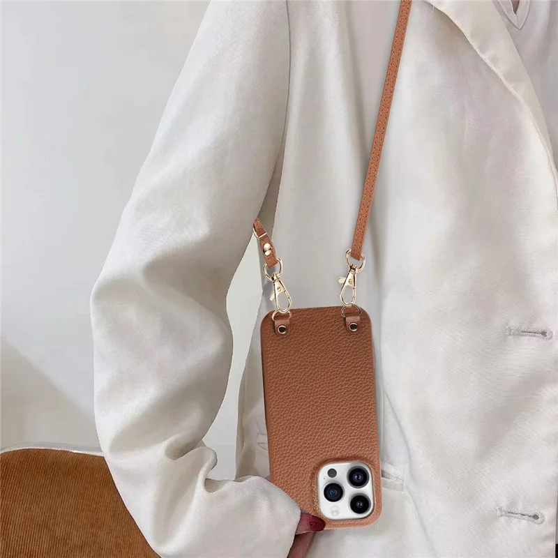 For iPhone 16 Pro Litchi Pattern Case with Lanyard Shockproof PC PU Leather Cover - Brown