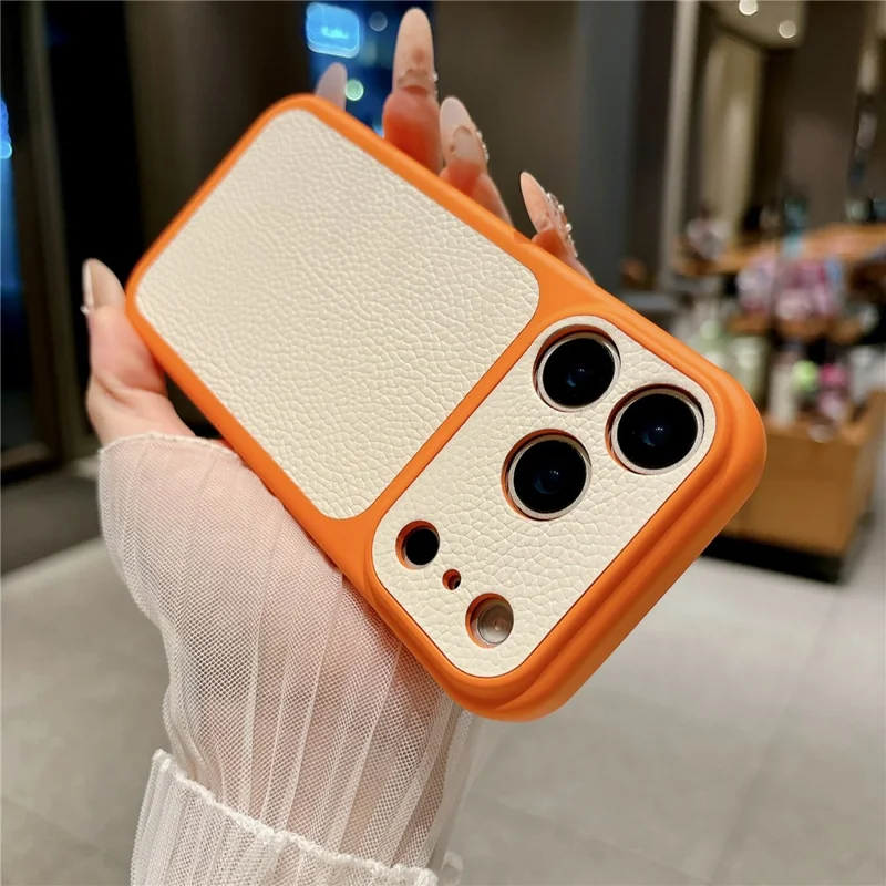 For iPhone 17 Pro Max Case Lychee Texture Genuine Cow Leather Coated TPU + PC Phone Cover - White  /  Orange
