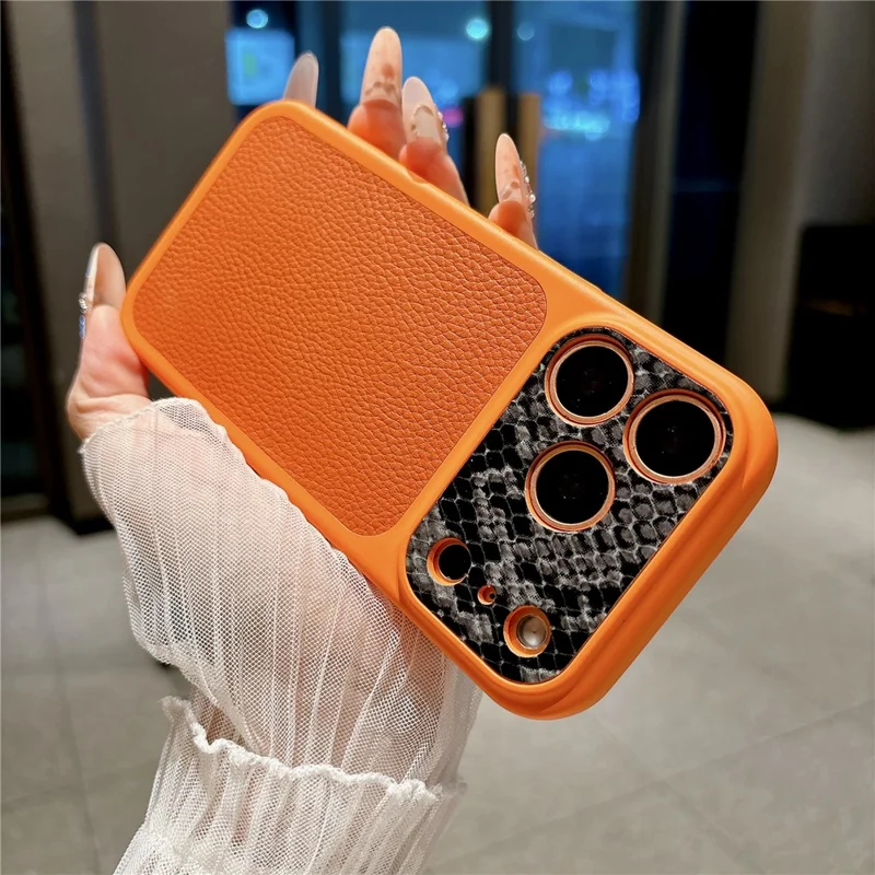 For iPhone 17 Pro TPU-hoes echt koeienleer Litchi-structuur + slangstructuur beschermhoes - Oranje