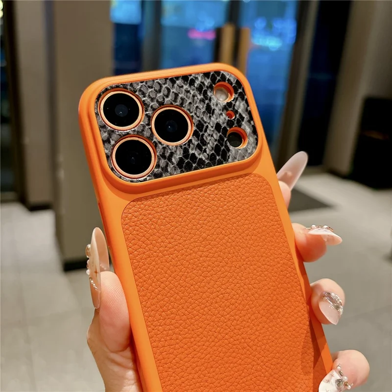 For iPhone 17 Pro TPU-hoes echt koeienleer Litchi-structuur + slangstructuur beschermhoes - Oranje