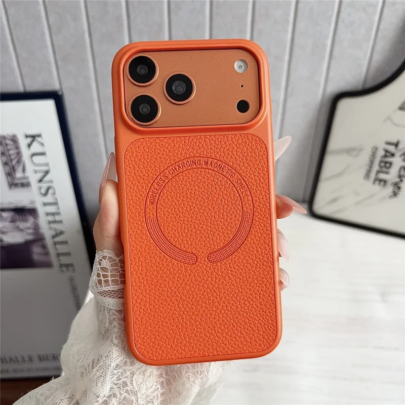 For iPhone 17 Pro Magnetic Case Litchi Texture PU Leather Coated PC + TPU Phone Back Cover - Orange
