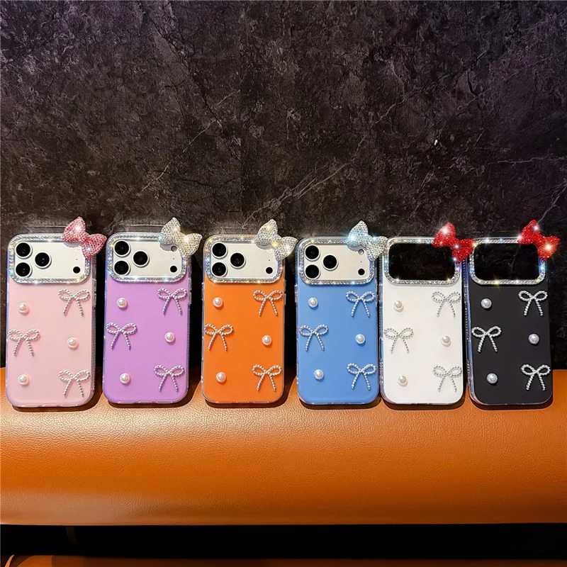 For iPhone 18 Pro / 17 Pro Case Pearl Bow Decor PC + TPU IMD Phone Cover with Rhinestone Camera Ring - Pearl White