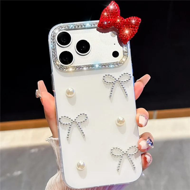 For iPhone 18 Pro / 17 Pro Case Pearl Bow Decor PC + TPU IMD Phone Cover with Rhinestone Camera Ring - Pearl White