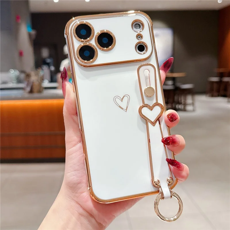For iPhone 17 Pro Max Case Electroplated Heart Pattern TPU Phone Back Cover with Wristband Kickstand - Ivory White