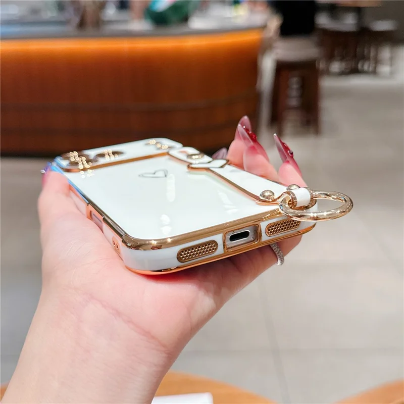 For iPhone  18 Pro / 17  Pro Case Electroplated Heart Pattern TPU Phone Back Cover with Wristband Kickstand - Ivory White
