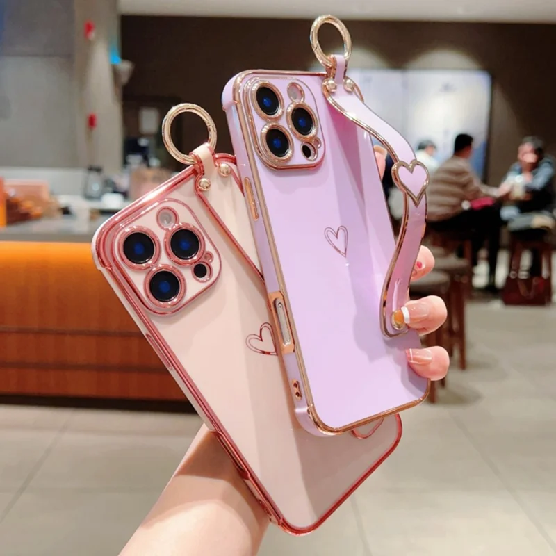 For iPhone 16 Pro Max Case Electroplated Heart Pattern TPU Phone Back Cover with Wristband Kickstand - Ivory White