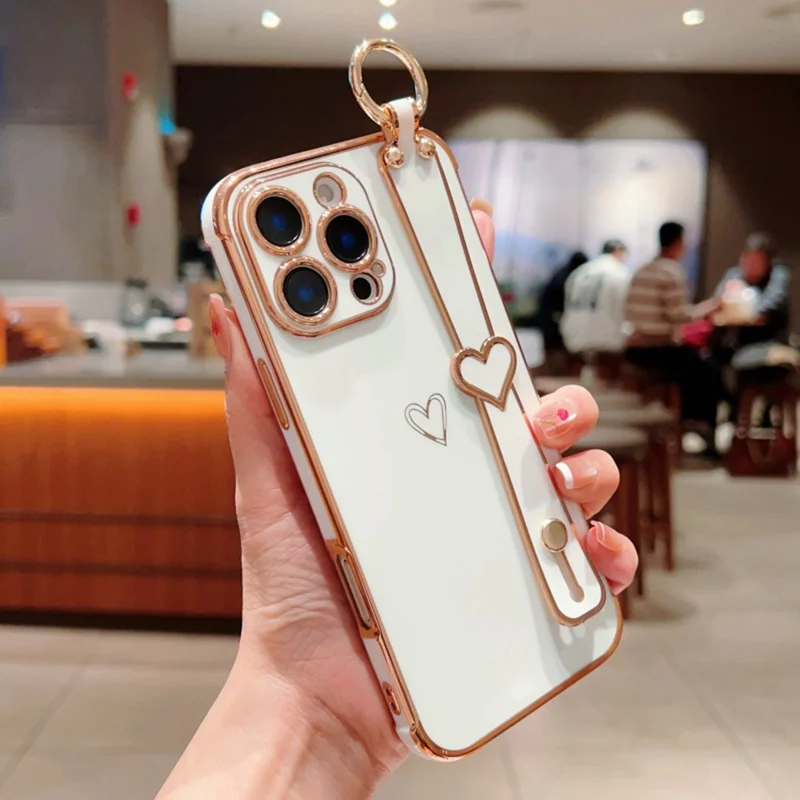For iPhone 16 Pro Max Case Electroplated Heart Pattern TPU Phone Back Cover with Wristband Kickstand - Ivory White