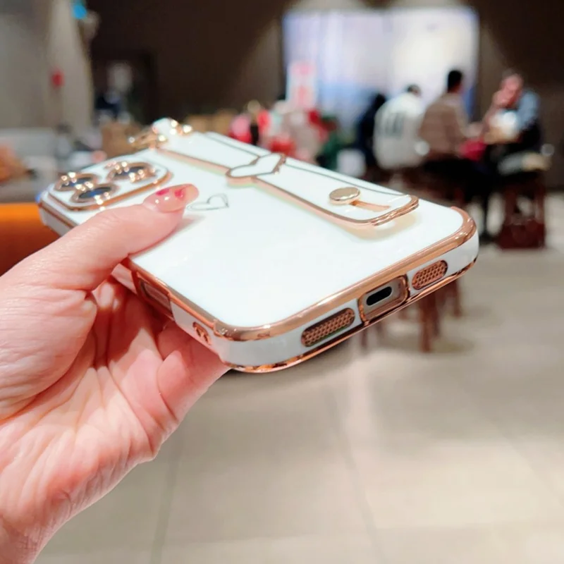 For iPhone 16 Pro Max Case Electroplated Heart Pattern TPU Phone Back Cover with Wristband Kickstand - Ivory White