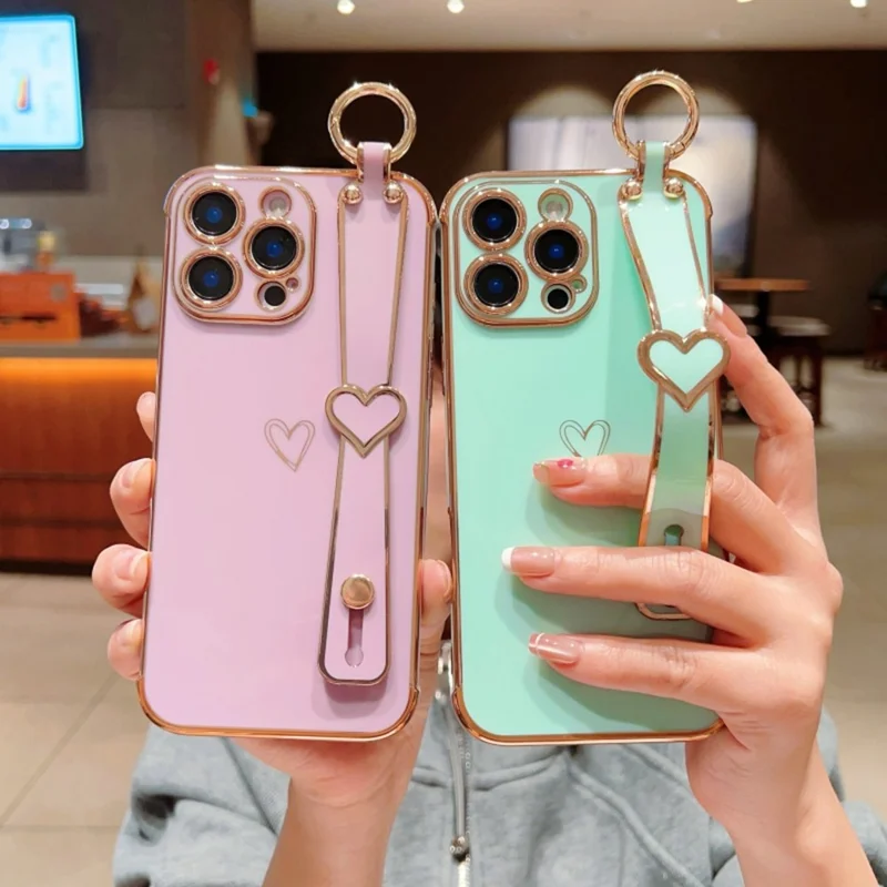 For iPhone 16 Pro Max Case Electroplated Heart Pattern TPU Phone Back Cover with Wristband Kickstand - Ivory White