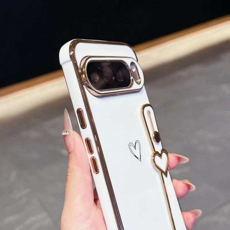 For Google Pixel 10 Pro XL Case Electroplated Heart Pattern TPU Phone Back Cover with Wristband Kickstand - Ivory White