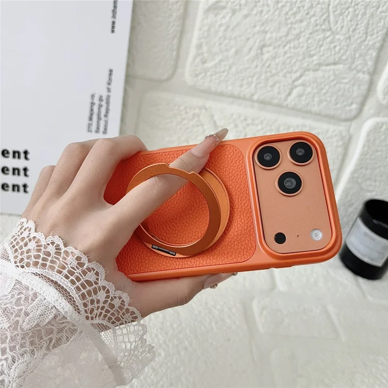 Für iPhone 17 Pro Max Hülle, rotierender magnetischer Ständer, Lederhülle mit Litschitextur, PC + TPU-Handyhülle - Orange
