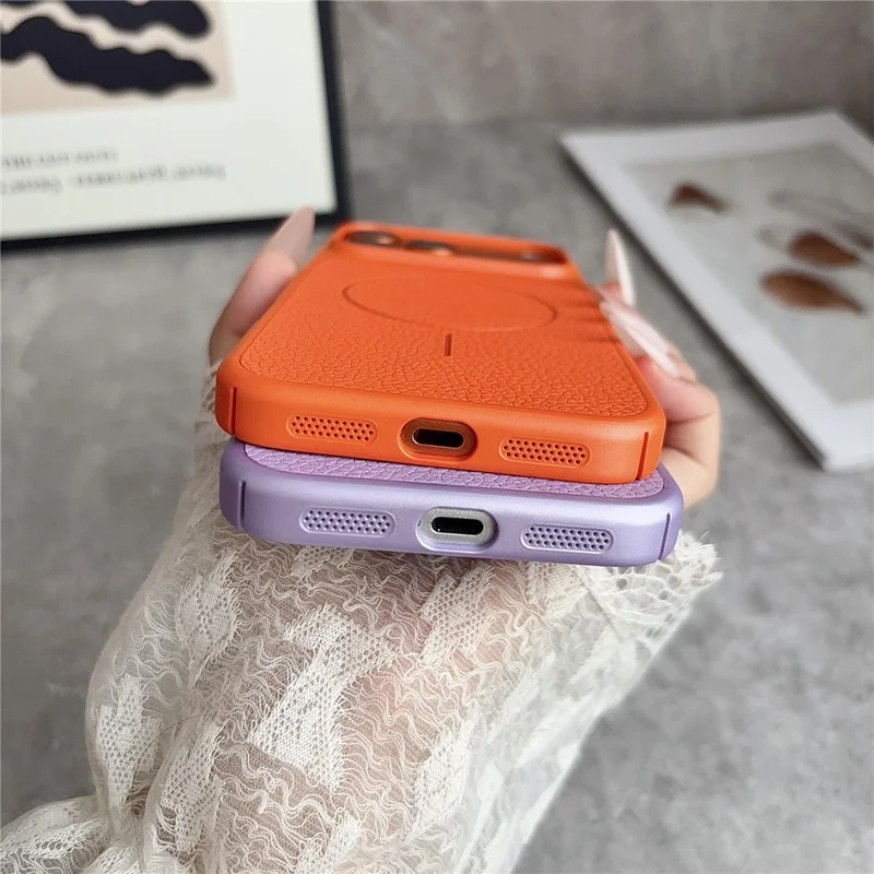 For iPhone 17 Pro Magnetic Case Litchi Texture Leather Coated PC + TPU Anti-Scratch Phone Cover - Orange