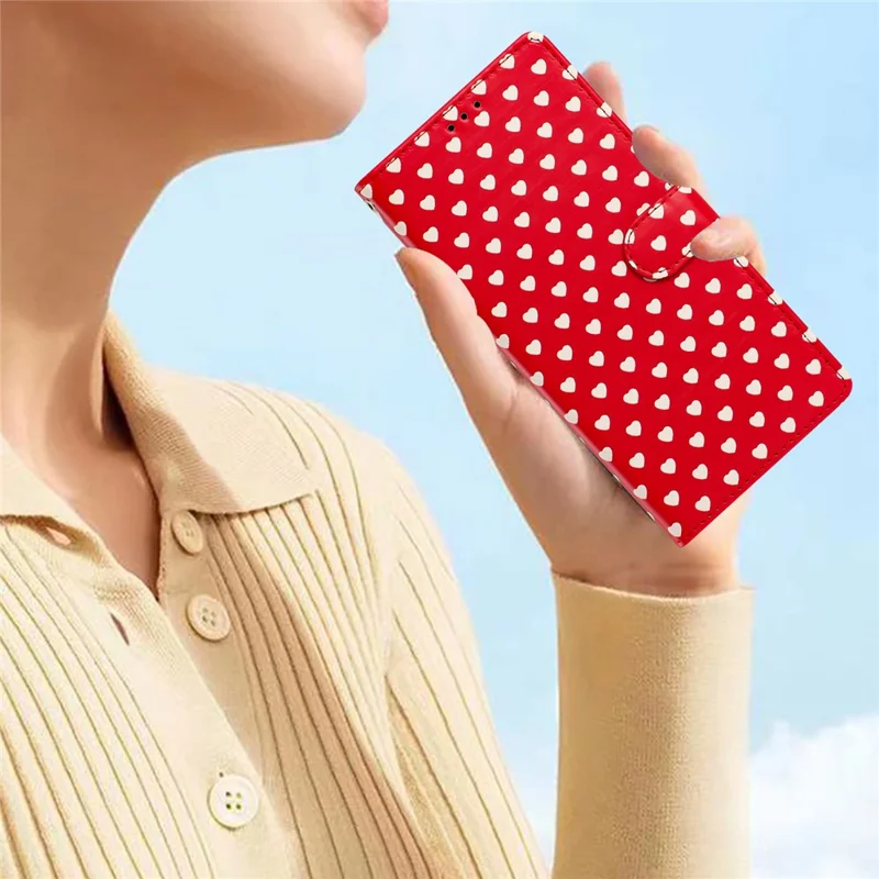 For iPhone 17e / 16e Case Heart Pattern PU Leather Flip Wallet Stand Phone Cover with Wrist Strap - Red