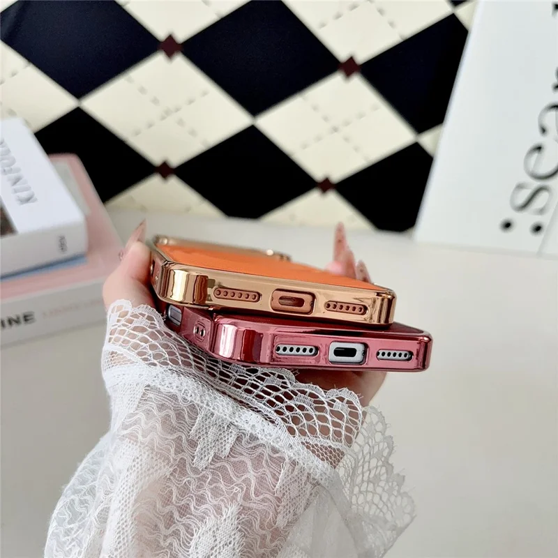For iPhone 17 Pro Magnetic Case 3D Ripple Texture Leather Coated PC + TPU Electroplated Phone Cover - Orange