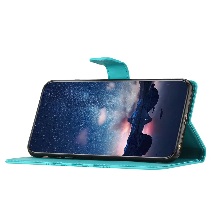 Phone Cover For Xiaomi Redmi 10 2022 4G / Redmi Note 11 4G (MediaTek) / Redmi 10 4G (2021) / Redmi 10 Prime Stand Wallet Retro Imprinted Pattern Skin-friendly Case with Strap - Sky Blue