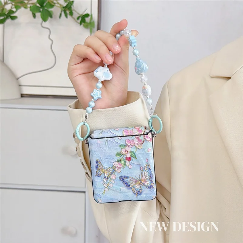For Samsung Galaxy Z Flip8 Magnetic Case Butterfly Pattern Phone PC Cover with Beaded Hand Chain Strap - Blue