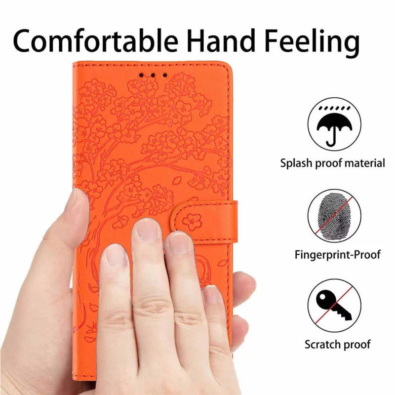 For Google Pixel 11a Stand Case Tree-and-Cat Pattern PU Leather Wallet Protective Phone Cover with Wrist Strap - Orange