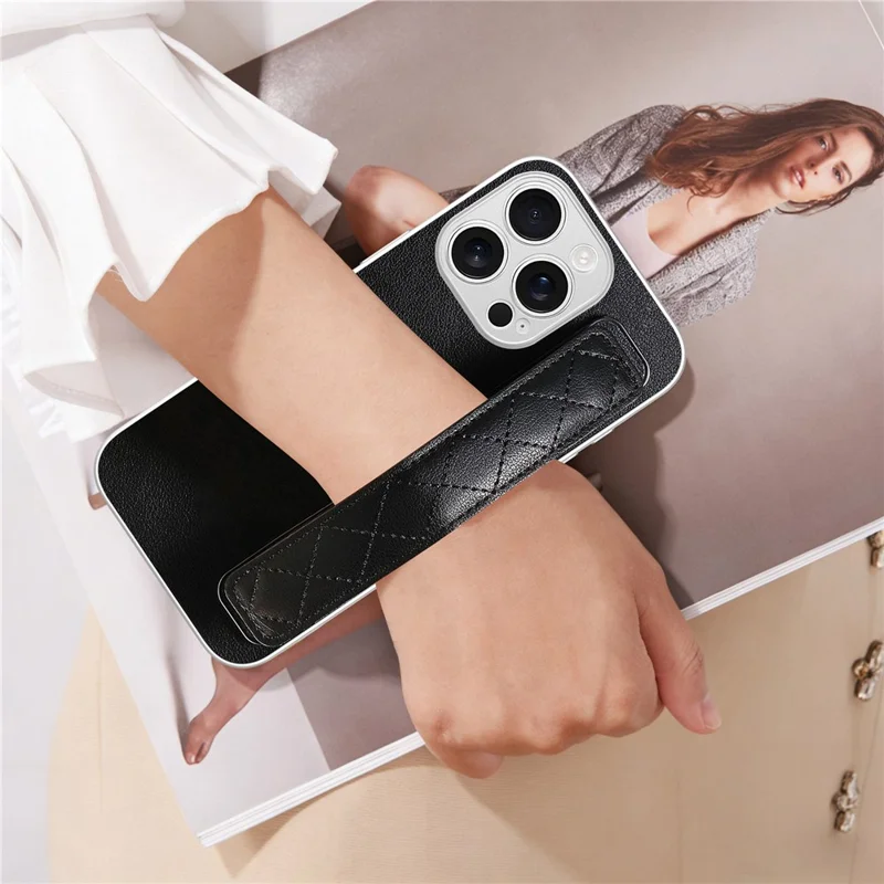 For iPhone 16 Pro Max Case PU Leather Coated PC + TPU Protective Phone Cover with Quilted Wrist Strap - Black