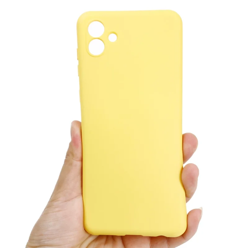 For Samsung Galaxy A04e 4G / F04 4G / M04 4G Soft Silicone Phone Case Anti-scratch Protective Back Cover with Strap - Yellow