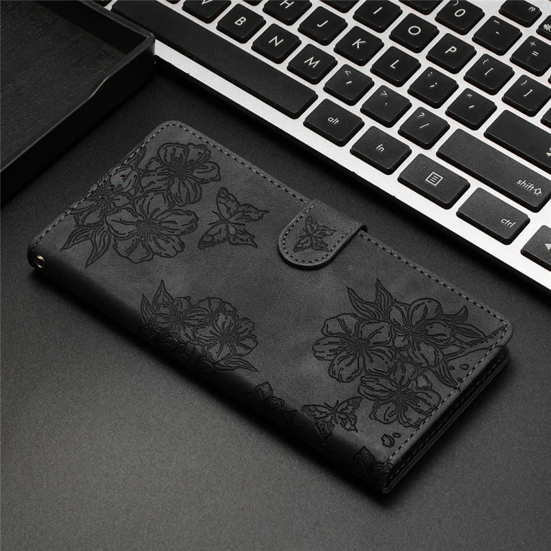 For Samsung Galaxy S27 Case Butterfly Flower Pattern Skin-Touch Leather Phone Cover - Black