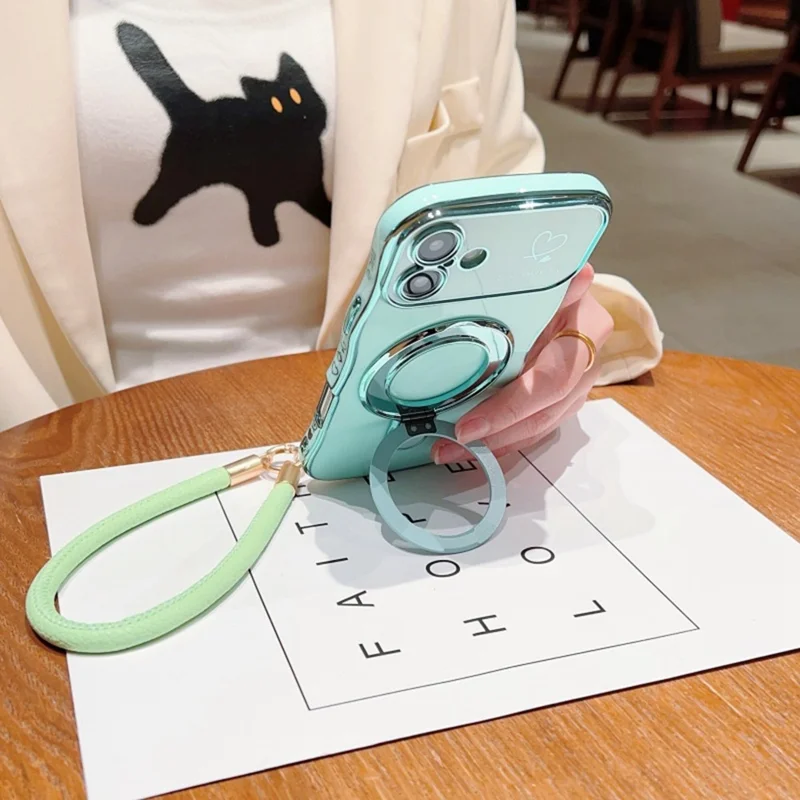 For iPhone 16 Case Kickstand Electroplating Wave Frame Love Printing TPU Back Cover with Hand Strap - Green
